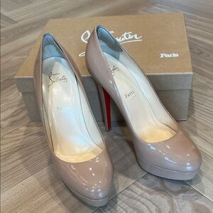 Christian Louboutin Beige Patent Heels with Iconic Red Soles
